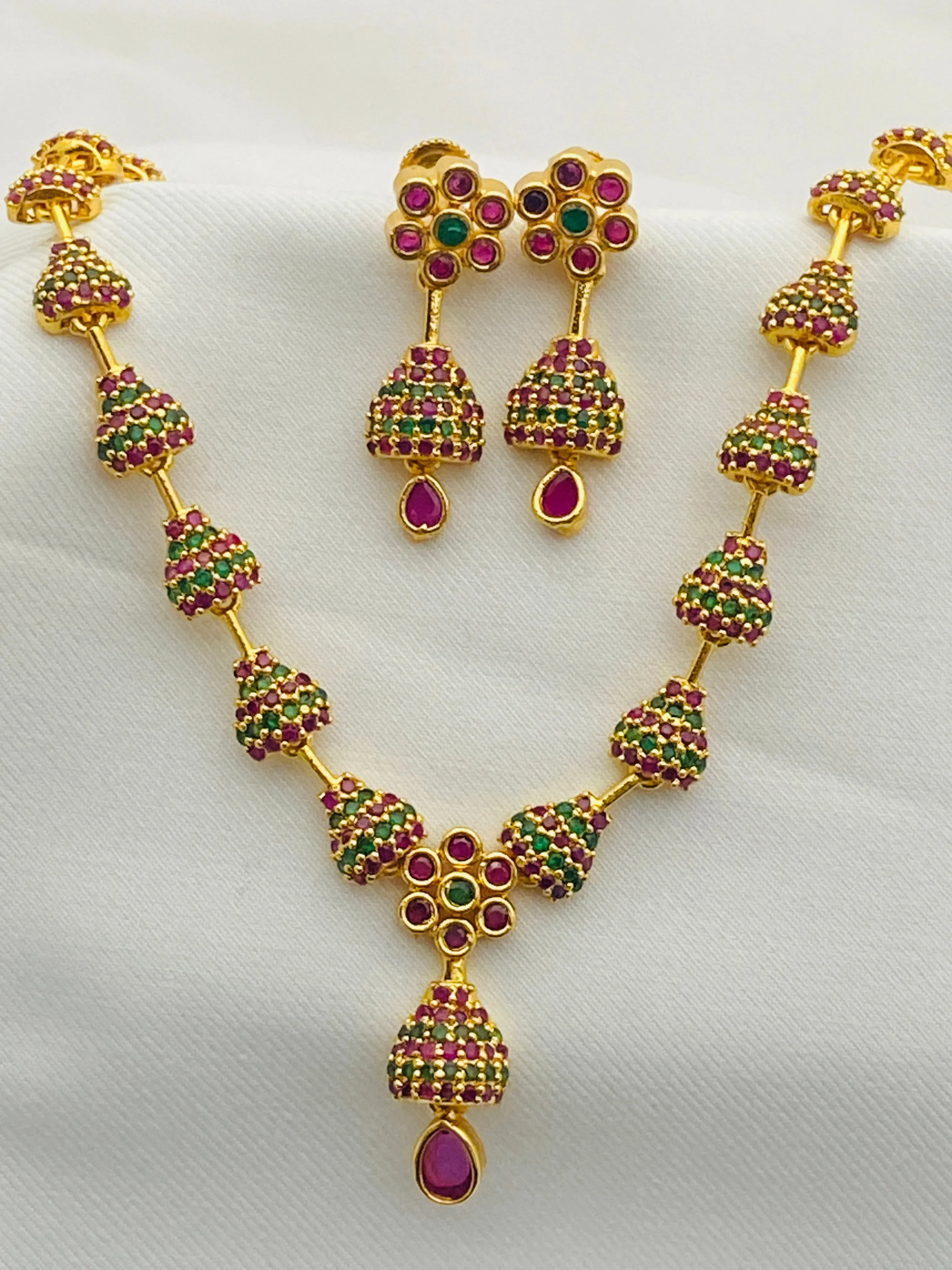 Beautiful Gold Plated Juhmka Designed Necklace And Earrings With Ruby And Emerald Stones