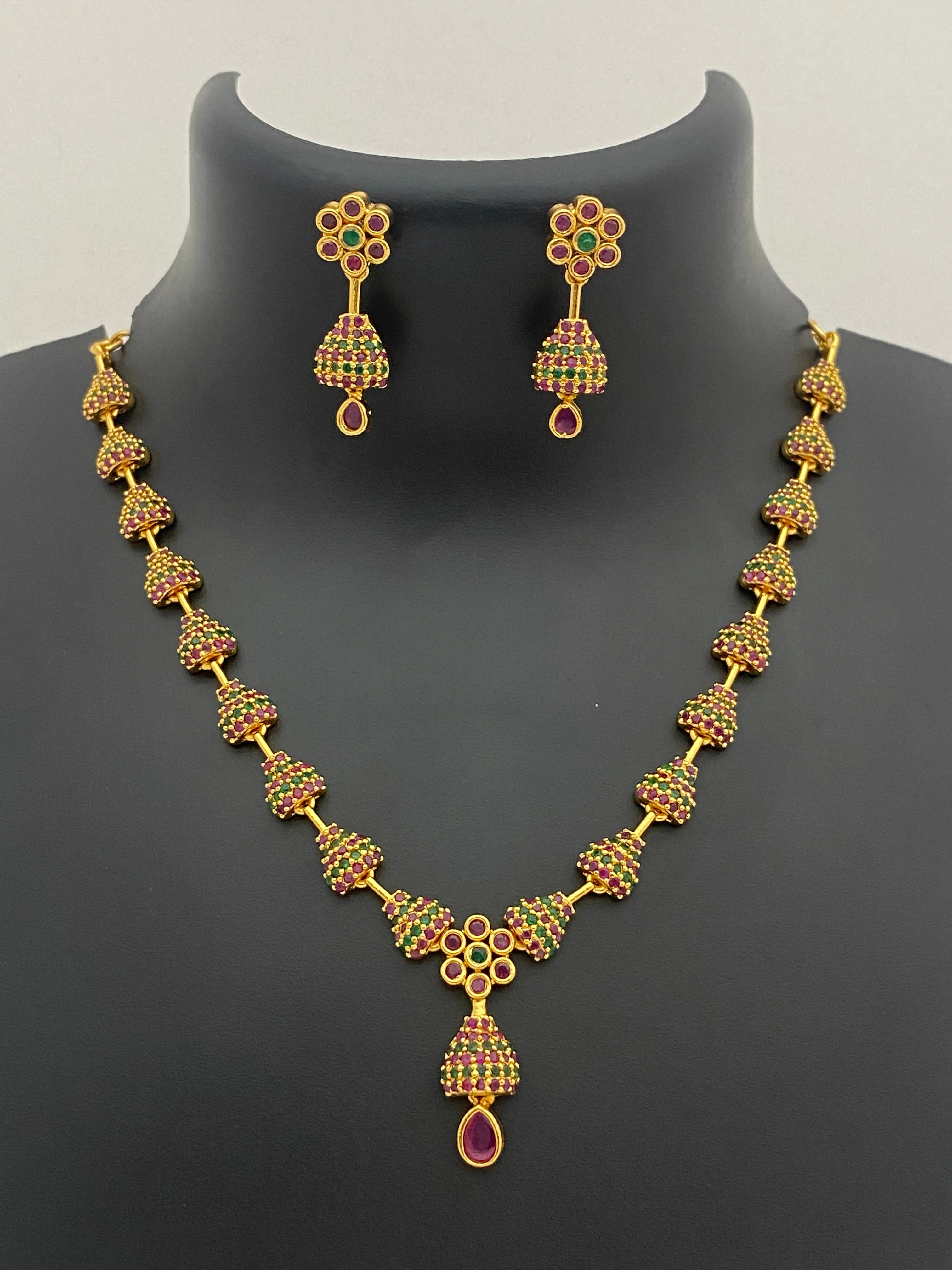 Beautiful Gold Plated Juhmka Designed Necklace And Earrings With Ruby And Emerald Stones