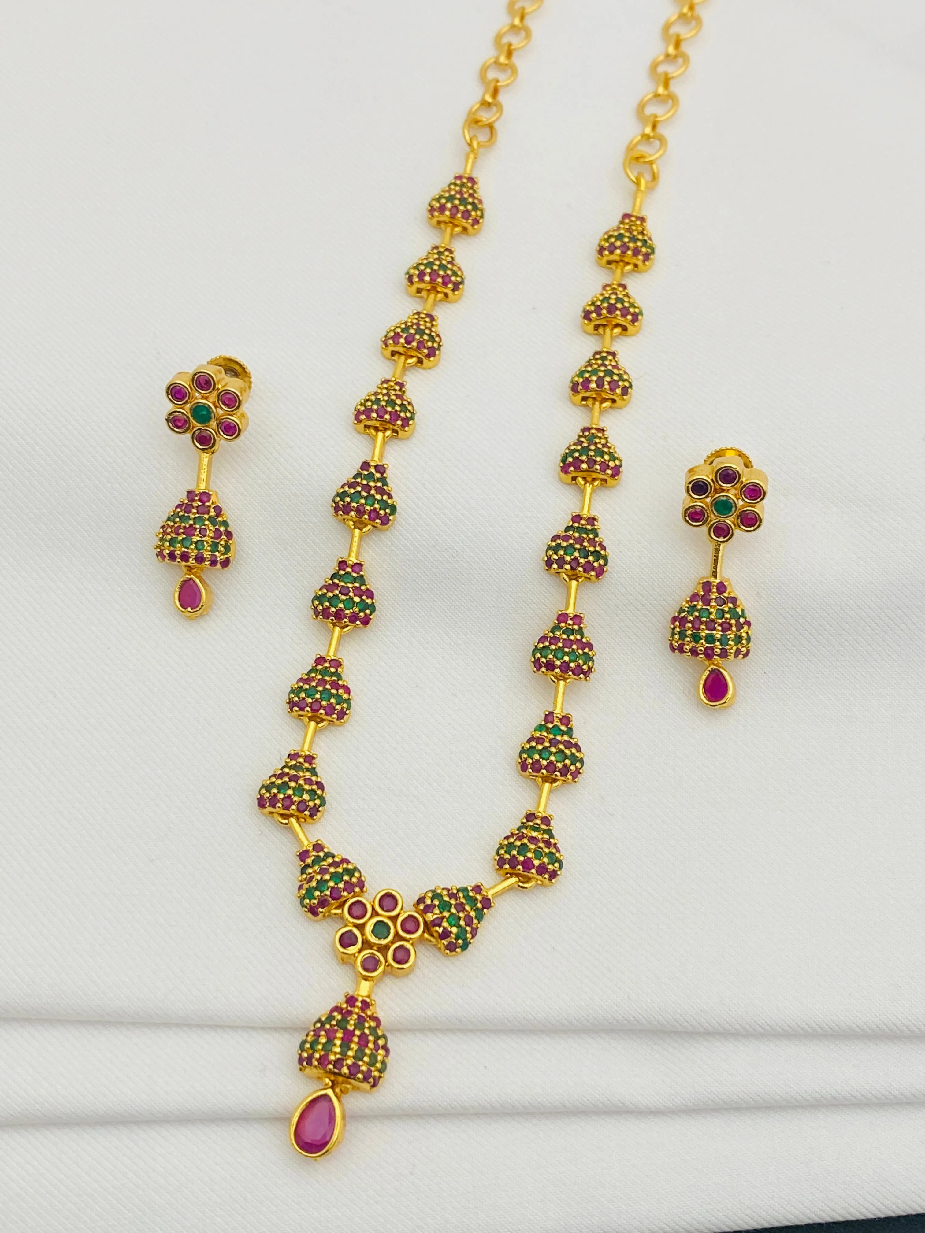 Beautiful Gold Plated Juhmka Designed Necklace And Earrings With Ruby And Emerald Stones