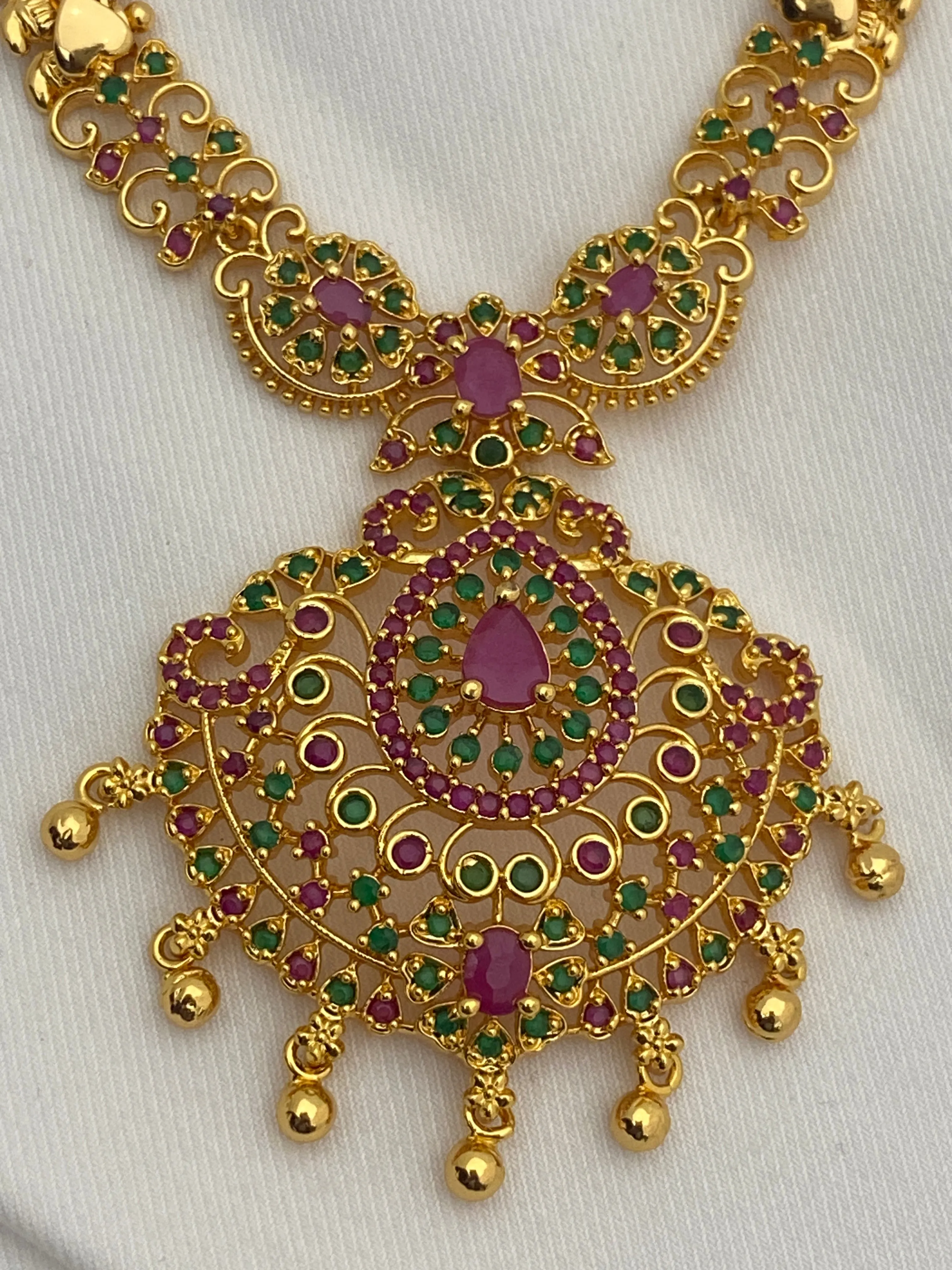 Beautiful Gold Plated Traditional Wear Ruby And Emerald Colored Necklace With Tear Drops