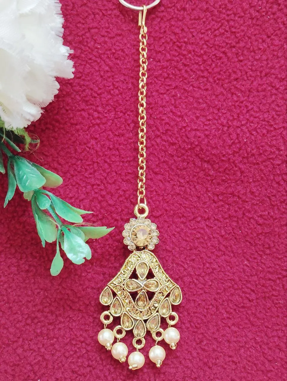 Beautiful gold tikka with pearls