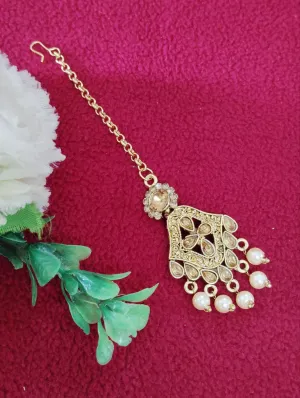 Beautiful gold tikka with pearls